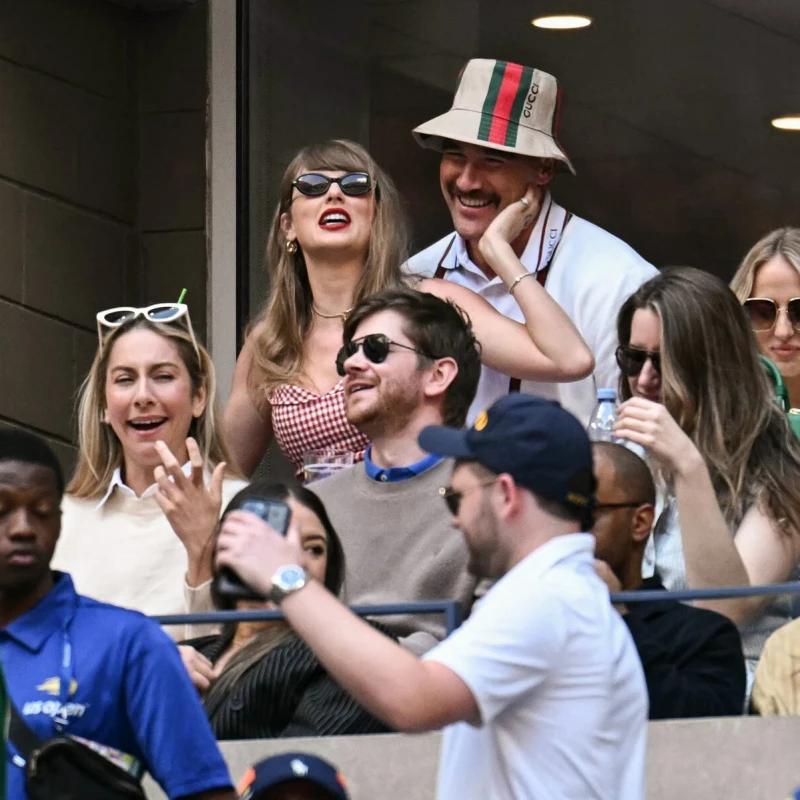 (Top Row L-R) US musician Taylor Swift, US NFL football player Travis Kelce, and US NFL football player Patrick Mahomes attend the men's final match between Italy's Jannik Sinner and USA's Taylor Fritz on day fourteen of the US Open tennis tournament at the USTA Billie Jean King National Tennis Center in New York City, on September 8, 2024.,Image: 905889338, License: Rights-managed, Restrictions:, Model Release: no, Credit line: ANGELA WEISS/AFP/Profimedia